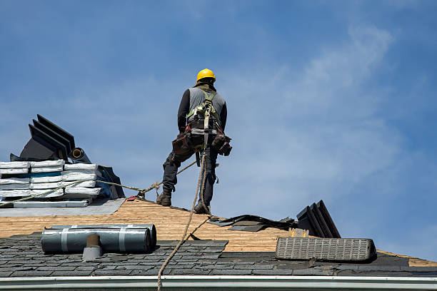 Professional Roofing technician working in University Park, IA